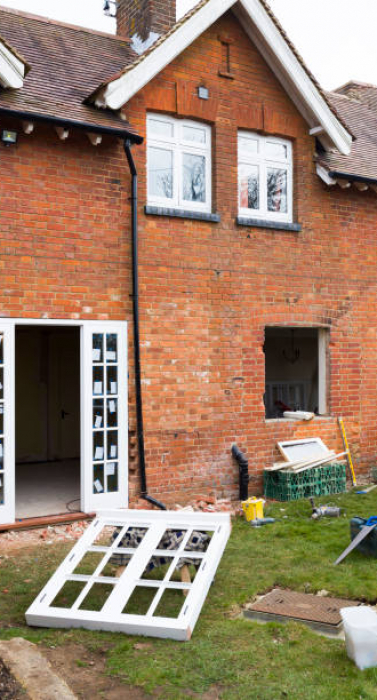 Fitting installing new replacement windows to a heritage house in UK